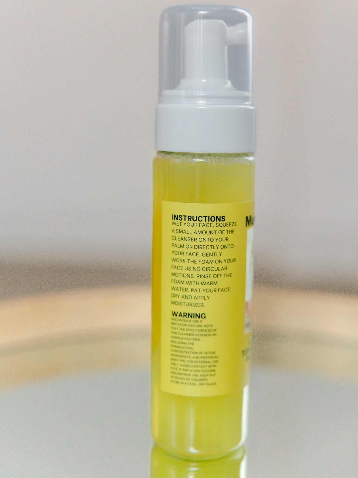 Turmeric Foaming Face Cleanser bottle with brightening and hydrating ingredients